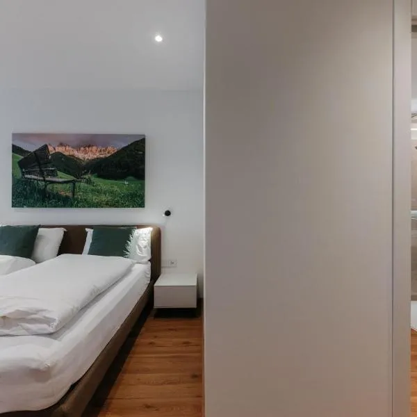 ecHo Apartments & SPA, ξενοδοχείο στη Μπρεσανόνε