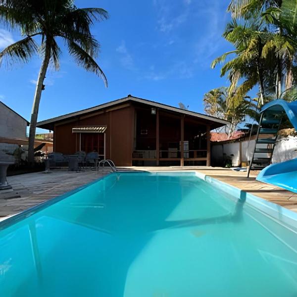 Casa de praia em condomínio com ar-condicionado e piscina