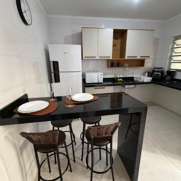 Apartamento térreo no Centro de Tramandaí, com ar condicionado, garagem e churrasqueira - Foto 4