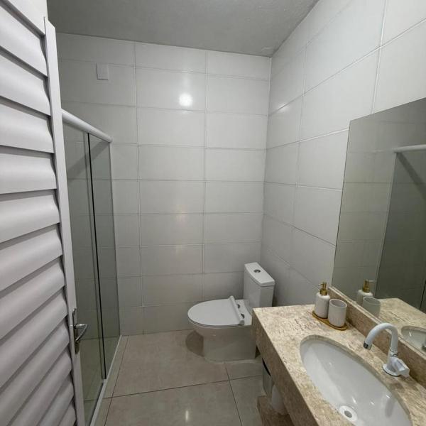 Apartamento térreo no Centro de Tramandaí, com ar condicionado, garagem e churrasqueira - Foto 3