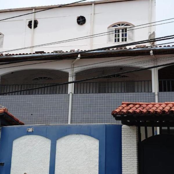 Quarto privativo com ar-condicionado l banheiro individual l Casa a 3 min da Praia com Garagem