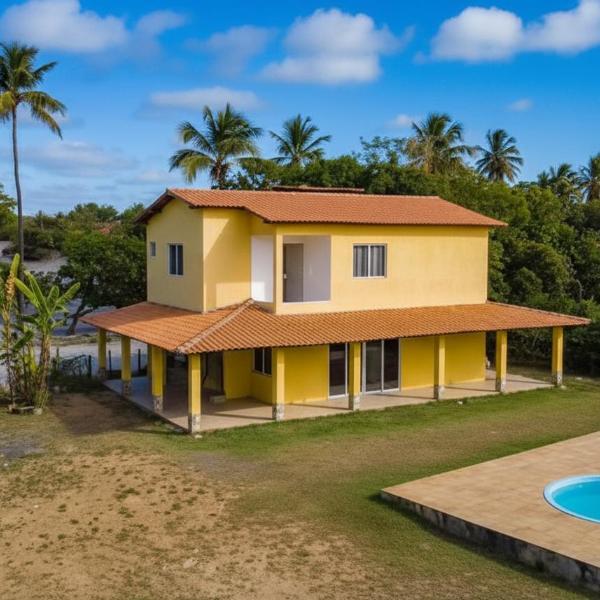 Casa em Imbassaí com 4 suítes, piscina privativa, perto da praia e pet friendly