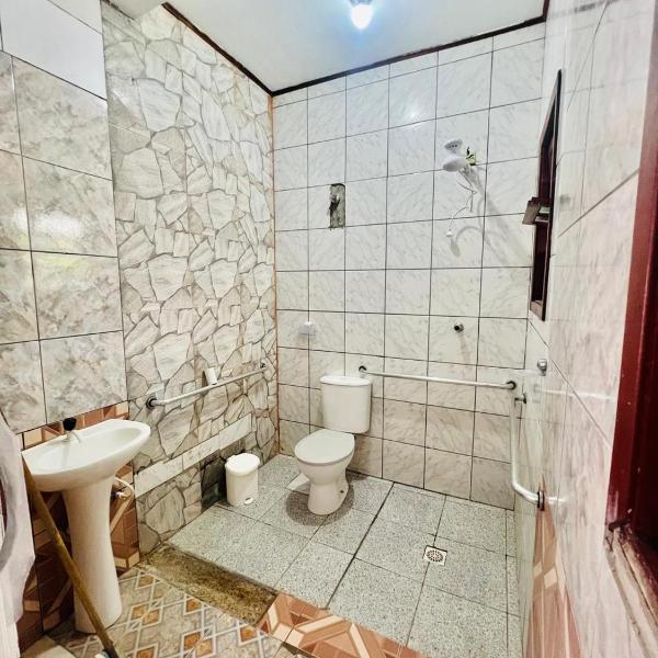 Quarto em pousada, piscina e área de lazer - Foto 3