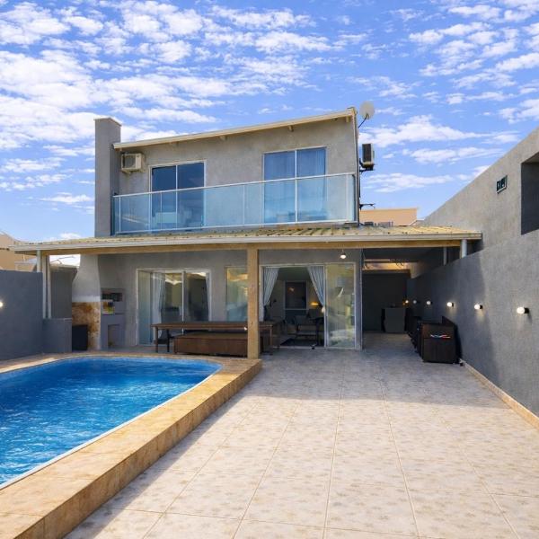 Casa com Piscina e Churrasqueira a 300m do Mar Ar Condicionado nos 3 Quartos