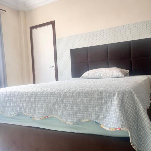 Quarto Suíte em APÊ Familiar a 6min Praia