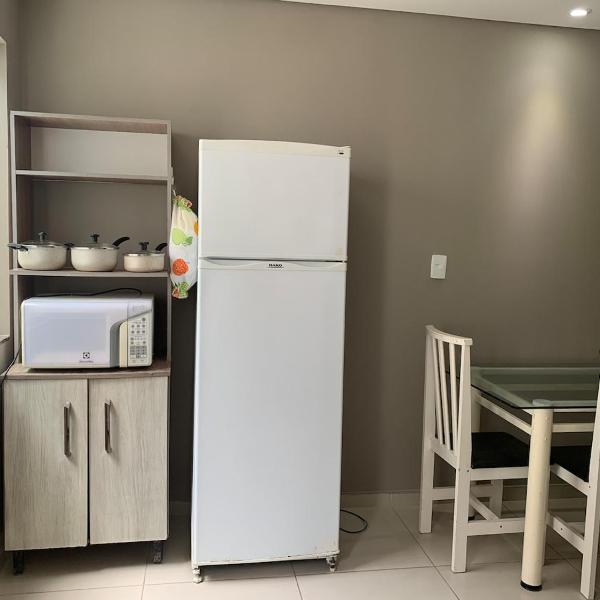Amplo apartamento com suíte e ar condicionado - Foto 4