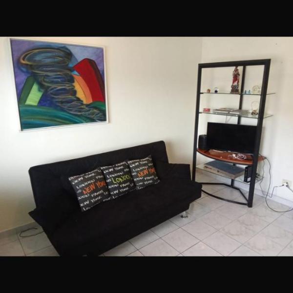 Apartamento mobliado Centro de São Vicente com garagem