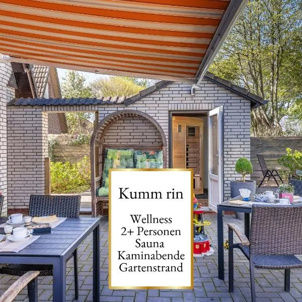 Fewo Kumm rin - privater Gartenstrand - Sauna & Kamin - Baby-Ausstattung, hotel a Carolinensiel