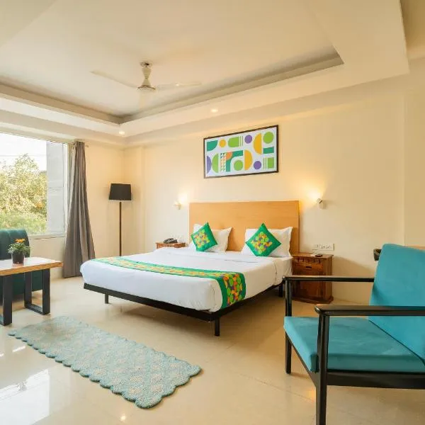 Treebo Twin Tree Suites, ξενοδοχείο σε Γκουργκάον