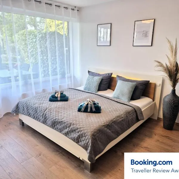 Meerzeit Apartment mit Terrasse & Parkplatz, хотел в Шарбойтц