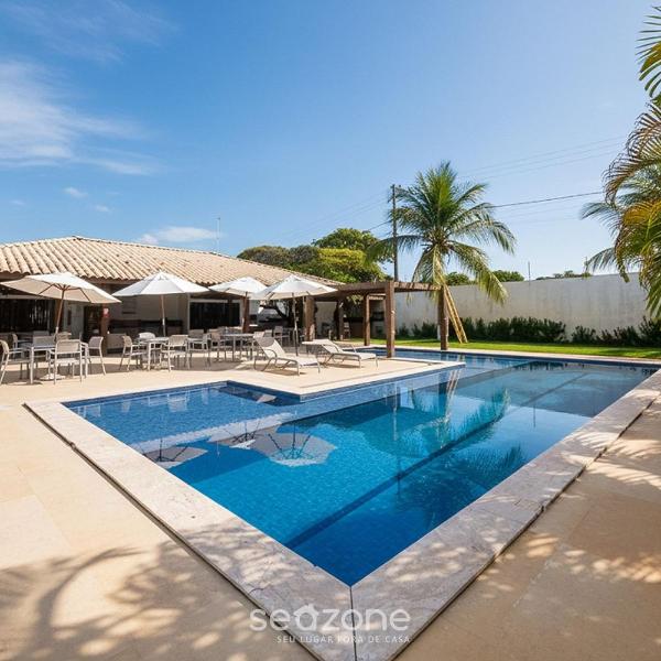 Casa em Cond. c/ Piscina e Churrasq. NTO0005