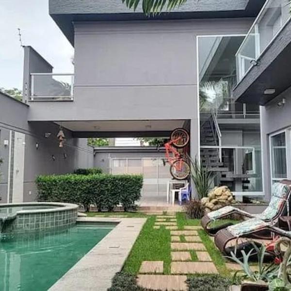 Casa de temporada com piscina em Peruíbe