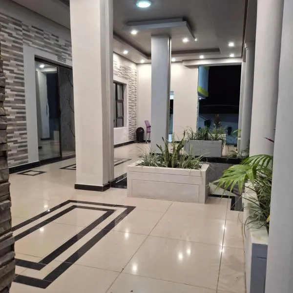 Silk Mbare Guest House, готель у місті Манзіні