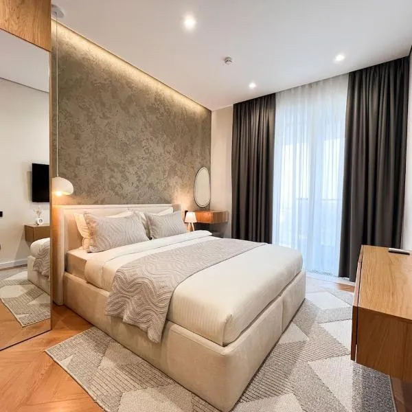 Lux Apart-Hotel Kislorod with a riverfront view, hotel di Yakkasaray