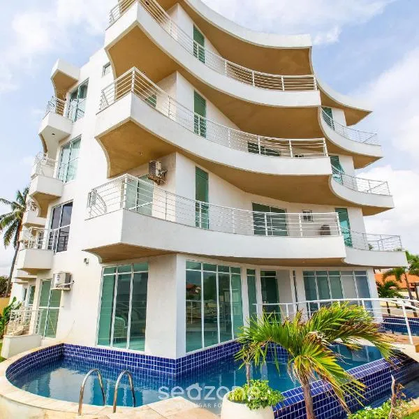 Aptos em Cond. c/ Piscina a 1 Quadra da Praia de Cumbuco - KVI, Hotel in Caucaia
