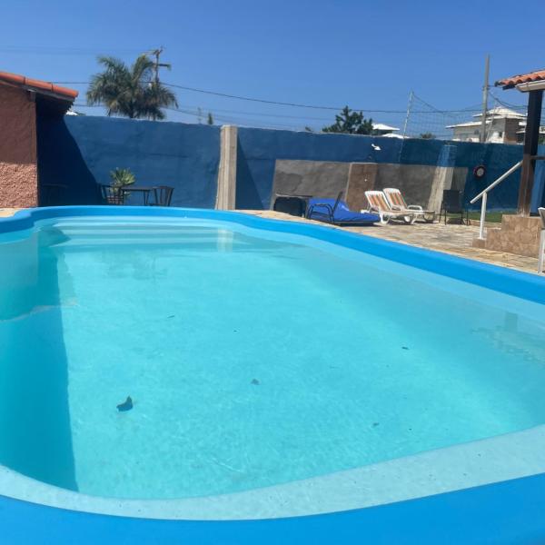 Casa ampla pé na areia a 100 passos do mar com roupa de cama, salão de jogos, churrasqueira e piscina - Foto 4
