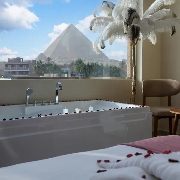 Pyramids Palace view inn With Rooftop Access & free airport pickup, hotel u gradu Kairo