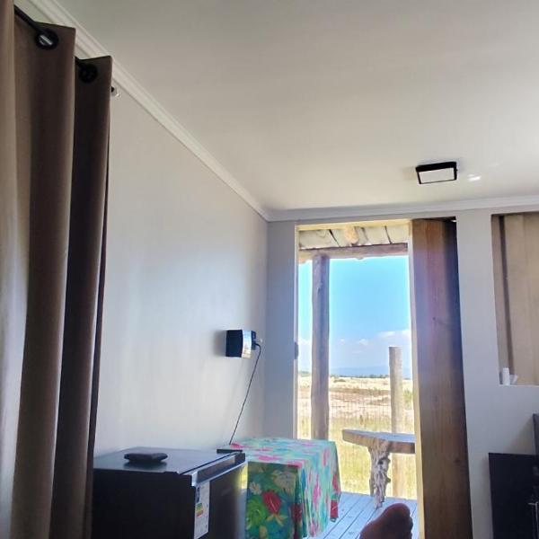 Casa Sossego, com vista para as dunas e montanhas da serra do mar com ar condicionado ,banho excelente a gás,ótimo acabamento construtivo próximo a praia - Foto 2