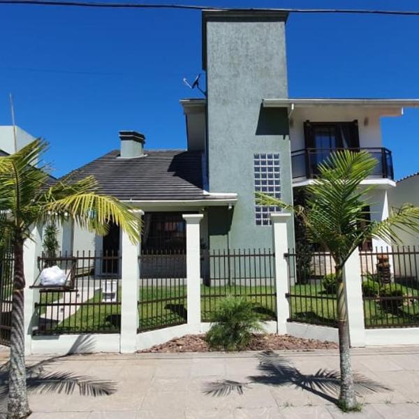 Casa com piscina em Torres