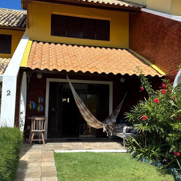 Chalé pé na areia