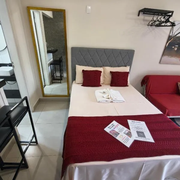 Apartamento novo com AR CONDICIONADO E GARAGEM, hotel din São Lourenço