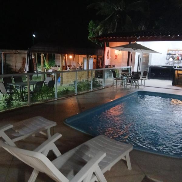 Linda casa com piscina, quiosque e churrasqueira a 150 metros da praia