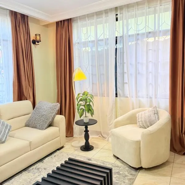 Viesnīca StayDar Cozy 2-Bedroom Apartment close to the city pilsētā Dāresalāma