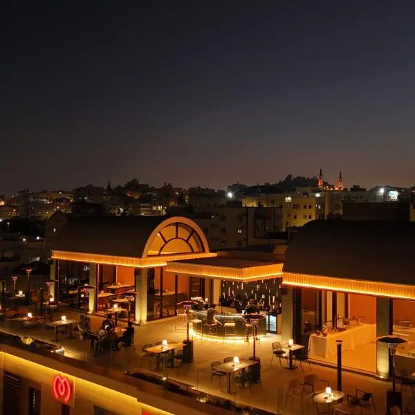 فندق ميد بوينت - Midpoint Hotel, отель в Абхе