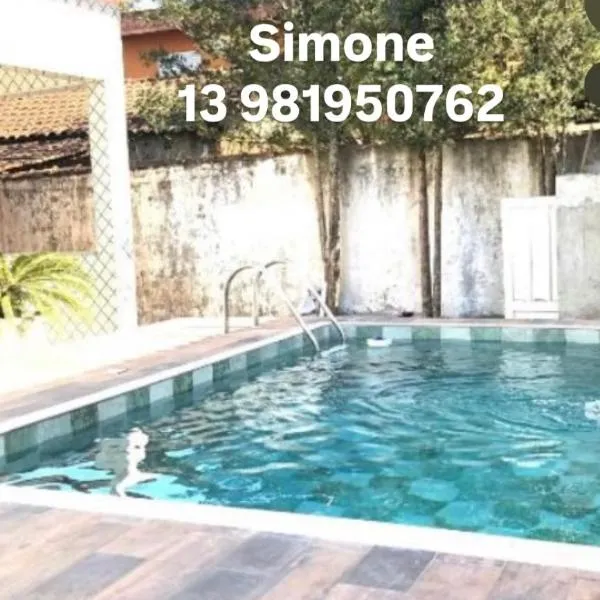 Casa espaçosa com Piscina e Churrasqueira 2 dorm, hotel en Guarujá