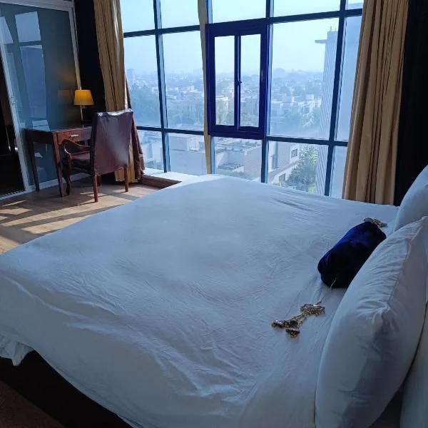 Taj Luxury Residences near Allama Iqbal International Airport Lahore, hotel sa Lahore