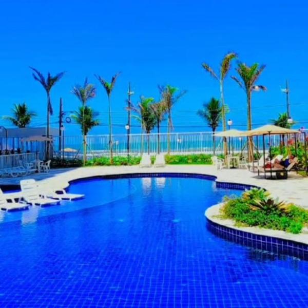 apartamento com piscina pé na areia