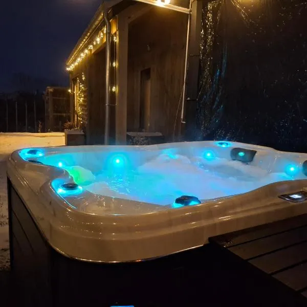 Chalet neuf avec jacuzzi et jardin privés - Durbuy, хотел в Дюрби