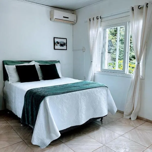 Refúgio até 8 pessoas Churrasqueira e pátio cercado, hotelli kohteessa Arroio do Meio