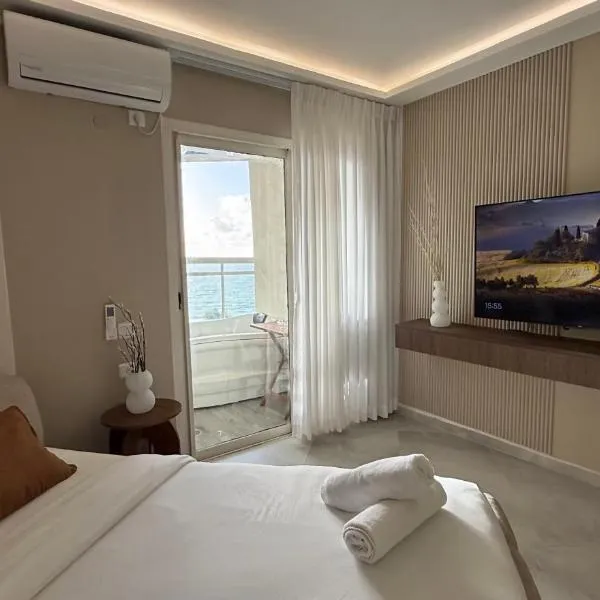 קו המים-Waterline Seafront Suites، فندق في نتانيا