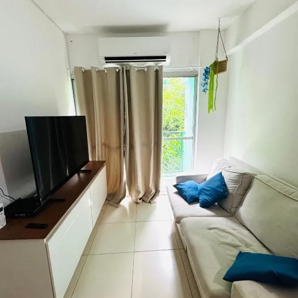 Aconchegante apartamento no Guarujá c Ar e garagem na Enseada, hotel a Guarujá