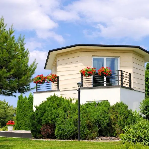 Dom za Tujami 30 min od centrum Poznania Strykowo, отель в городе Strykowo