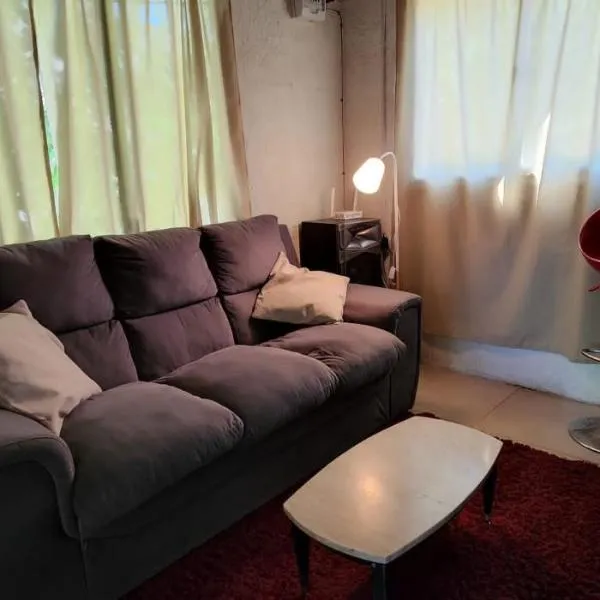 Casa tipo cabaña cerca del rio con todo, Hotel in Aguas Corrientes