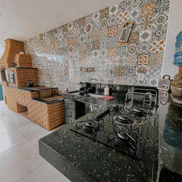 Suítes em casa ampla com área gourmet