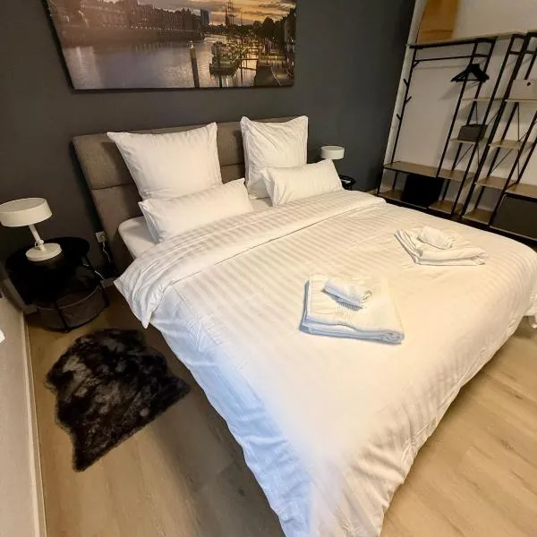 Zeit zu Zweit- 90 qm Wohnung mit Sauna & Garten, hotel in Weyhe