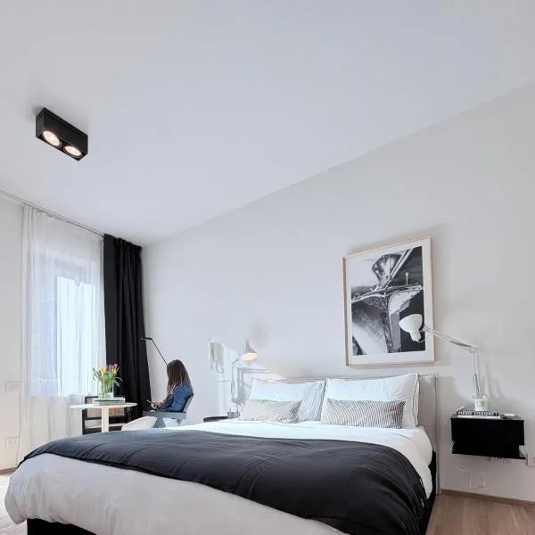 Raro Dimore Lecco - Design Suite - senza barriere architettoniche, hotel a Lecco