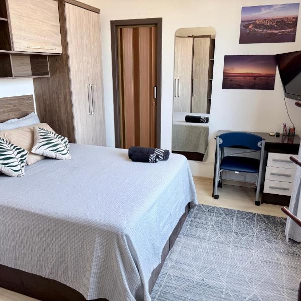 Apartamento Confortável com Vista para o Pôr do Sol - Foto 2