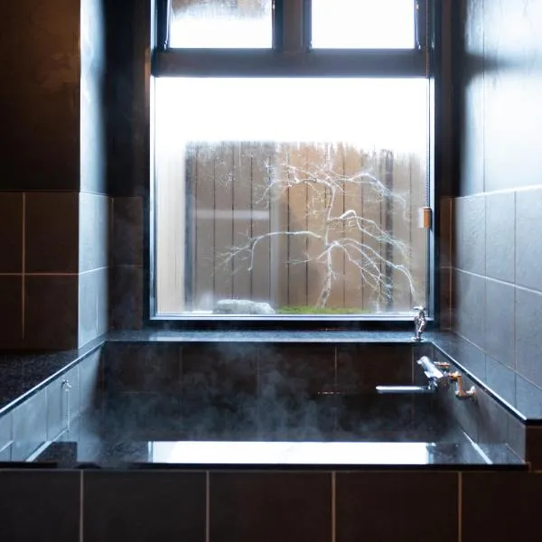 三朝温泉ようこそ旅館 Youkoso Ryokan, hotelli kohteessa Misasa