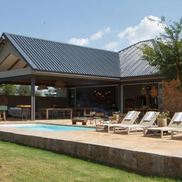 Stroomrivier Lodge, Hotel in Boshoek