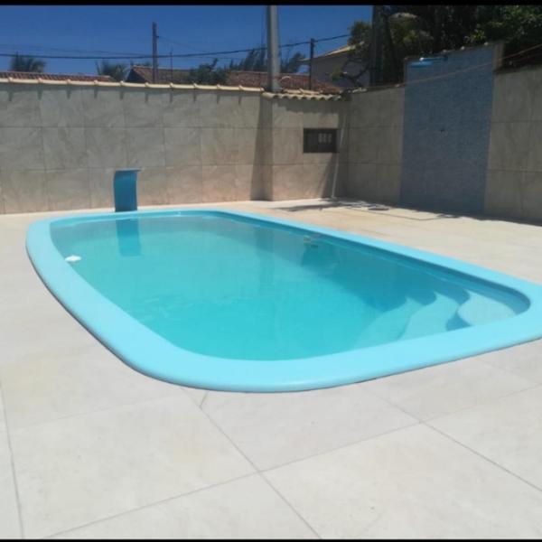 Casa com 2 quartos, piscina, área gourmet e garagem
