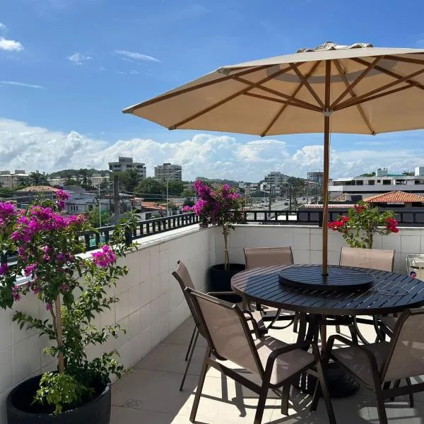 Cobertura pé na areia, 3 suítes e área externa, hotell i Ilhéus