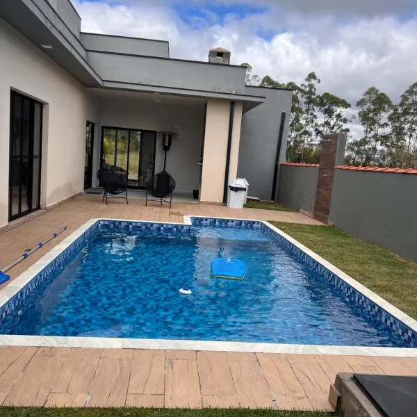 Casa condomínio Ninho Verde l, hotel en Porangaba