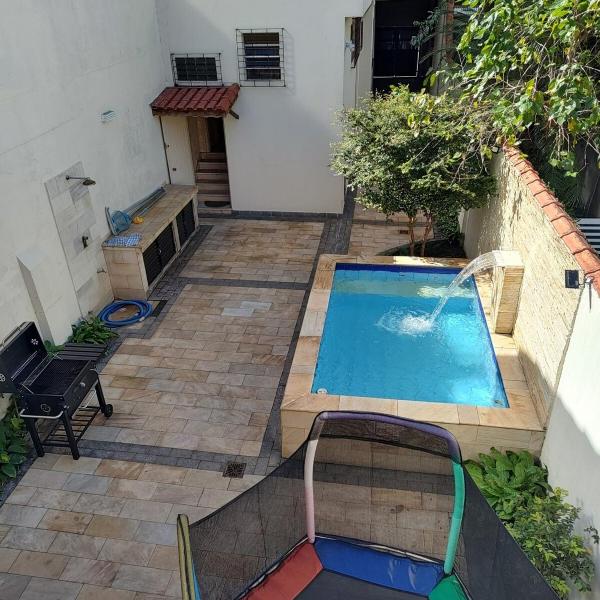 House 6 bedrooms 2 blocks Santos beach with pool