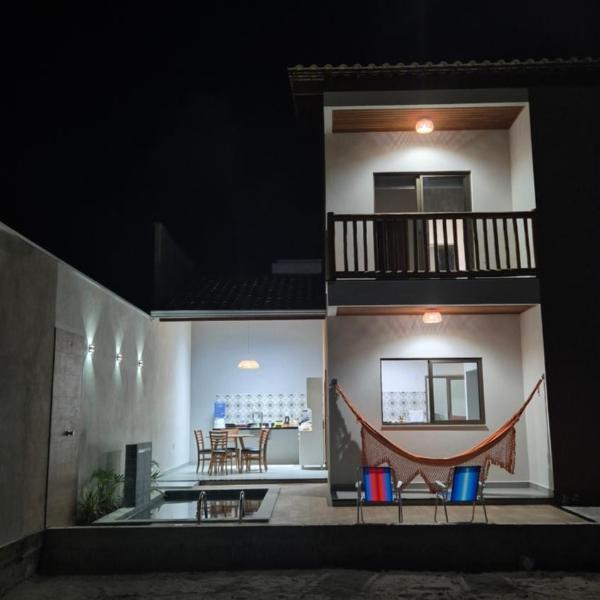 Casa Sol com piscina e 2 suítes com ar condicionado, pertinho da praia - Foto 3
