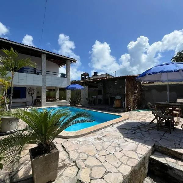 Canto da Ita, Casa e Pousada, 250 m da praia com piscina e churrasqueira、イタマラカーのホテル