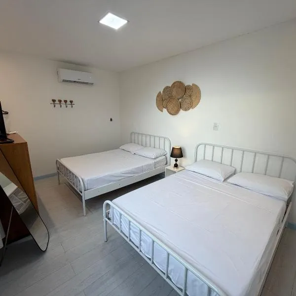 Casa Veiga - Kitnet à beira-mar em Anchieta - ES โรงแรมในอันเชียตา